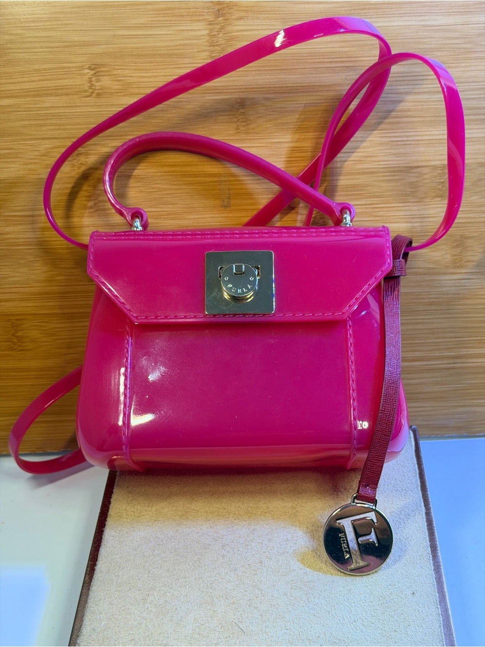 Furla Hot Pink Jelly Crossbody Bag EUC
With free Furla Bag Charm